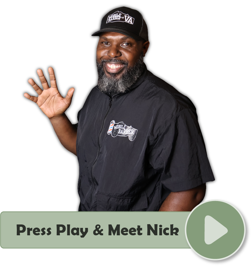 Nicholas Carter, the mobile barber of virginia beach, sitting down smiling